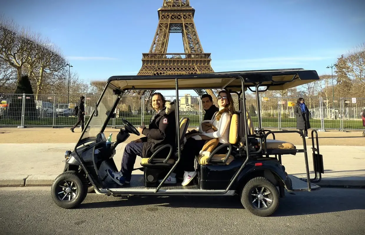 Private golf cart in front of the Eiffel Tower in Paris
