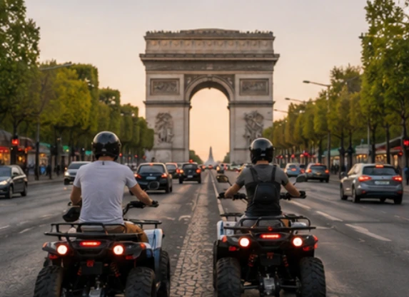 Quad riders on the Champs-Élysées facing the Arc de Triomphe